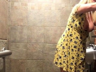 Blonde Big-Tit MILF Vibrates Pussy in a Bar's Restroom!