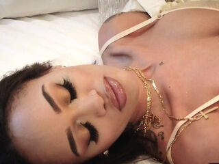 Curvy tattooed ebony MILF shows big tits