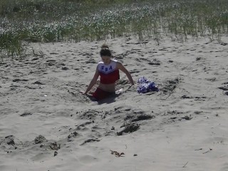 Cheerleader buries in quicksand
