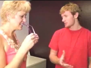 Sexy mom gives a sloppy bj on young guy Joey in the laundry